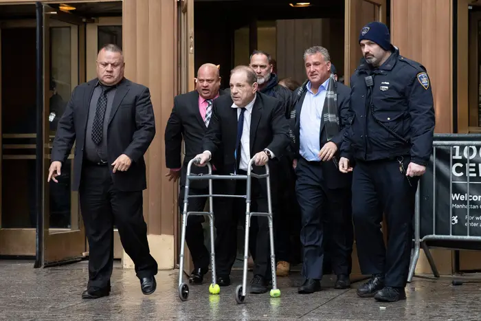 Harvey Weinstein leaves court following a hearing, in New York. Weinstein's bail was increased from $1 million to $5 million on Wednesday over allegations he violated bail conditions by mishandling his electronic ankle monitor
